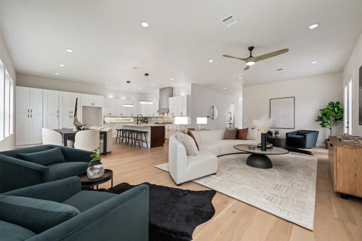 1004 Karen Avenue Austin, TX 78757 - Photo 3 of 29 a living room with furniture white walls and kitchen view