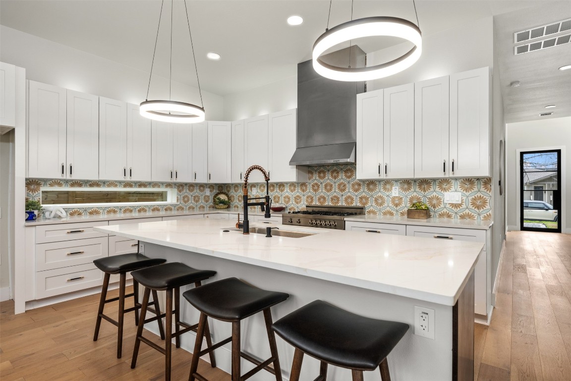 1004 Karen Avenue Austin, TX 78757 - Photo 5 of 29 a kitchen with a sink cabinets and window