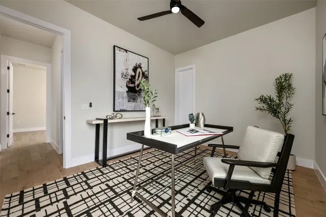 a view of a workspace with furniture