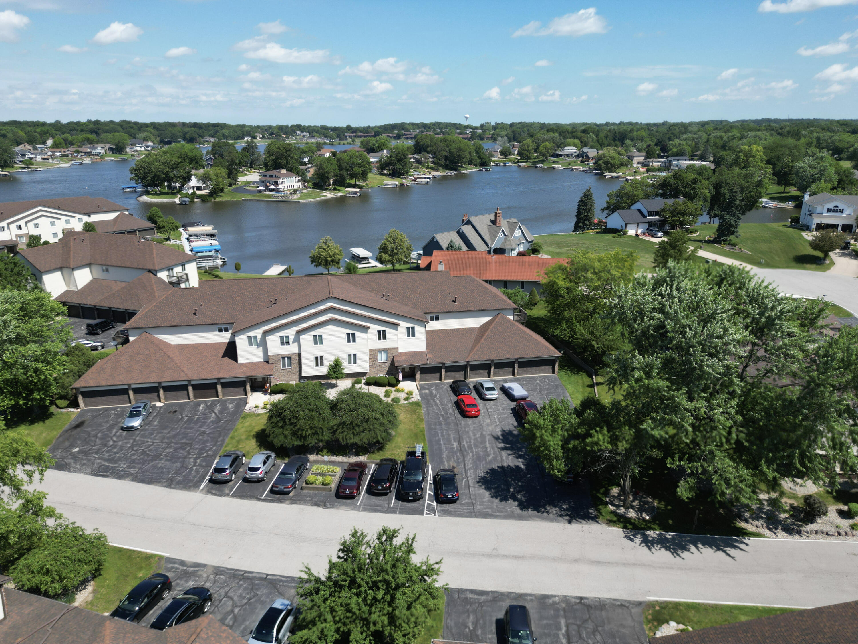 5065 Spinnaker Lane, Unit D Crown Point, IN 46307 - Photo 41 of 42 an aerial view of a house with a lake view