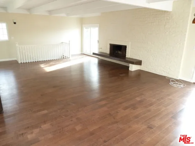 a view of livingroom and hardwood
