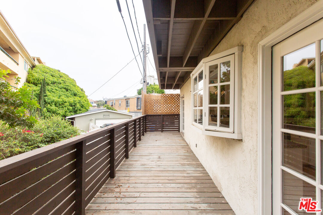3900 Pacific Avenue Marina del Rey, CA 90292 - Photo 38 of 65 a view of balcony with wooden floor and fence