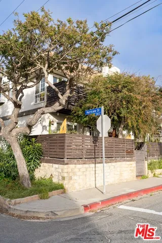 a view of a building with sitting area