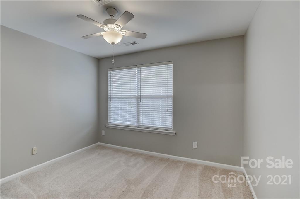 1121 Sienna Sand Way Fort Mill, SC 29708 - Photo 21 of 30 a view of an empty room with a window