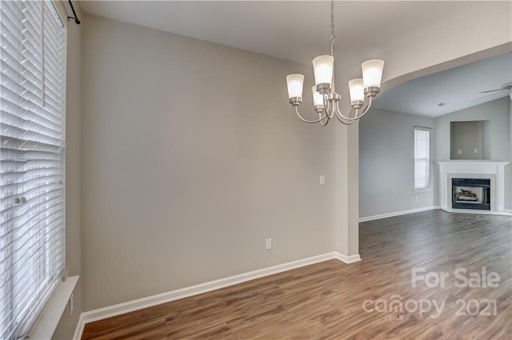 1121 Sienna Sand Way Fort Mill, SC 29708 - Photo 8 of 30 a view of a livingroom with wooden floor