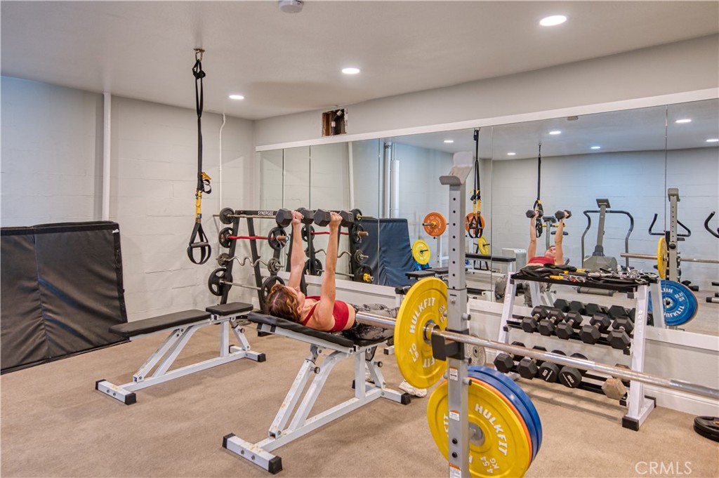 711 Pacific Coast Highway, Unit 421 Huntington Beach, CA 92648 - Photo 12 of 35 a view of a room with gym equipment