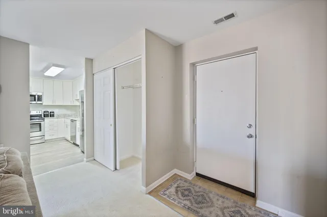 a view of kitchen with wooden floor