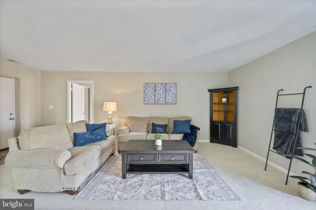 a living room with furniture and a couch