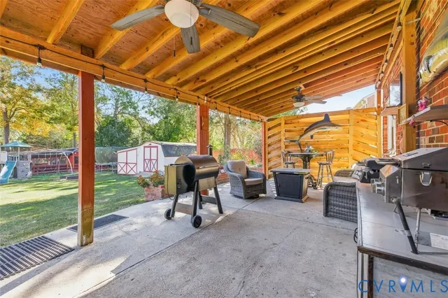 a view of a chairs and table in the balcony
