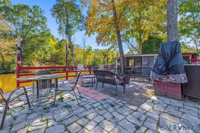 a view of a swimming pool with a patio