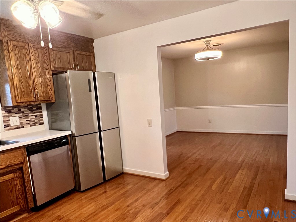 905 Forestview Drive Colonial Heights, VA 23834 - Photo 7 of 48 a view of kitchen with wooden floor and electronic appliances