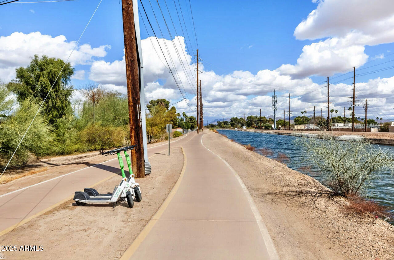 7436 East Chaparral Road, Unit 264B Scottsdale, AZ 85250 - Photo 17 of 22 a view of a lake with a nearby beach