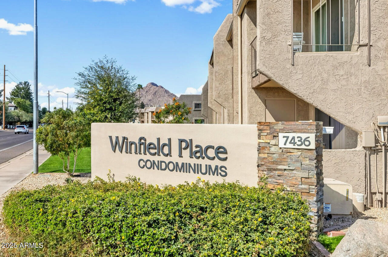 7436 East Chaparral Road, Unit 264B Scottsdale, AZ 85250 - Photo 22 of 22 a sign broad on the side of a building