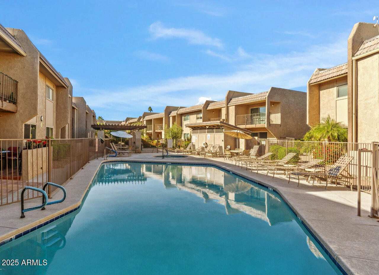 7436 East Chaparral Road, Unit 264B Scottsdale, AZ 85250 - Photo 3 of 22 a view of swimming pool from a balcony
