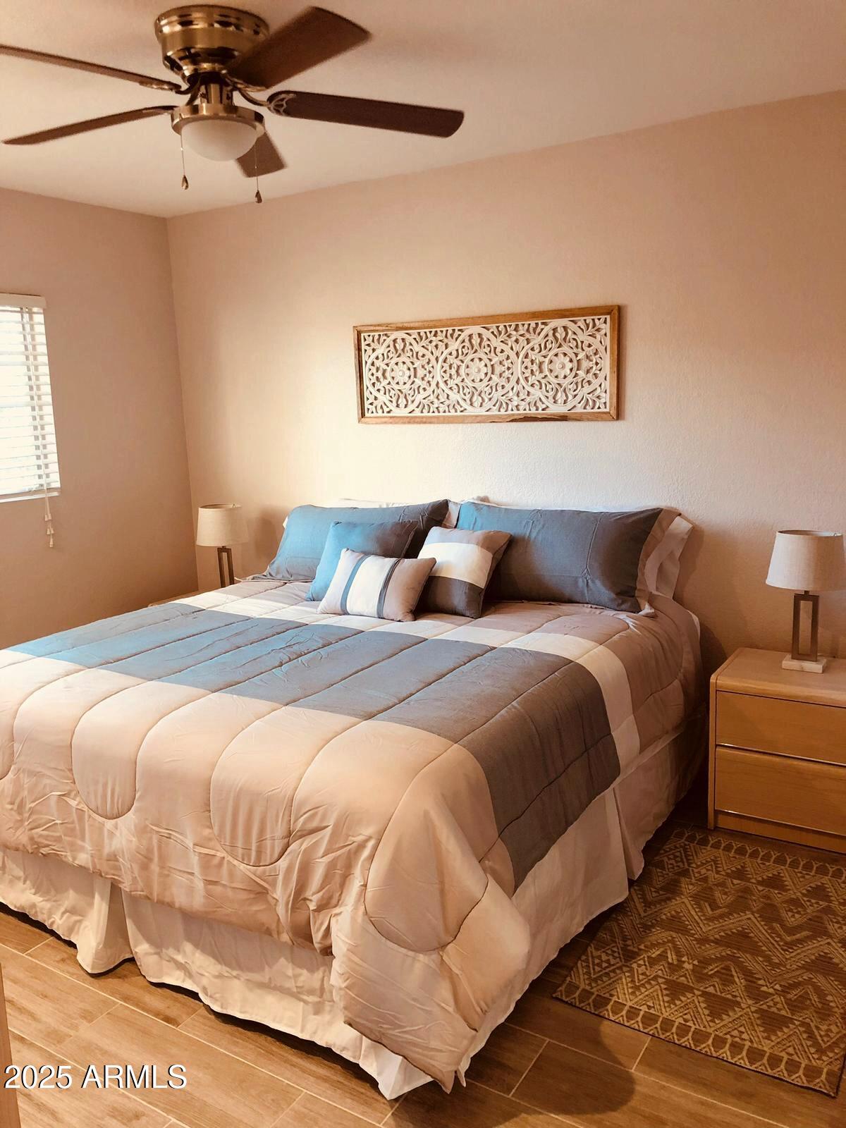 7436 East Chaparral Road, Unit 264B Scottsdale, AZ 85250 - Photo 9 of 22 a bedroom with a bed and window