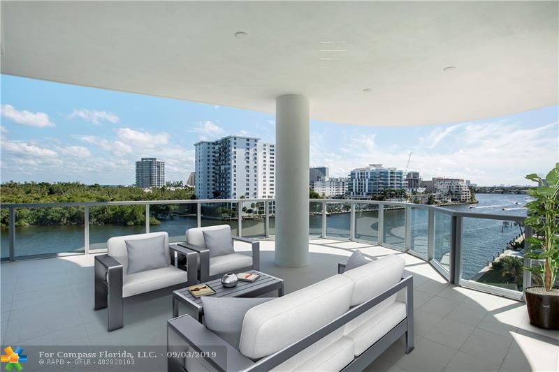 Virtual Staging Of The SE Balcony With Direct Intracoastal Views
