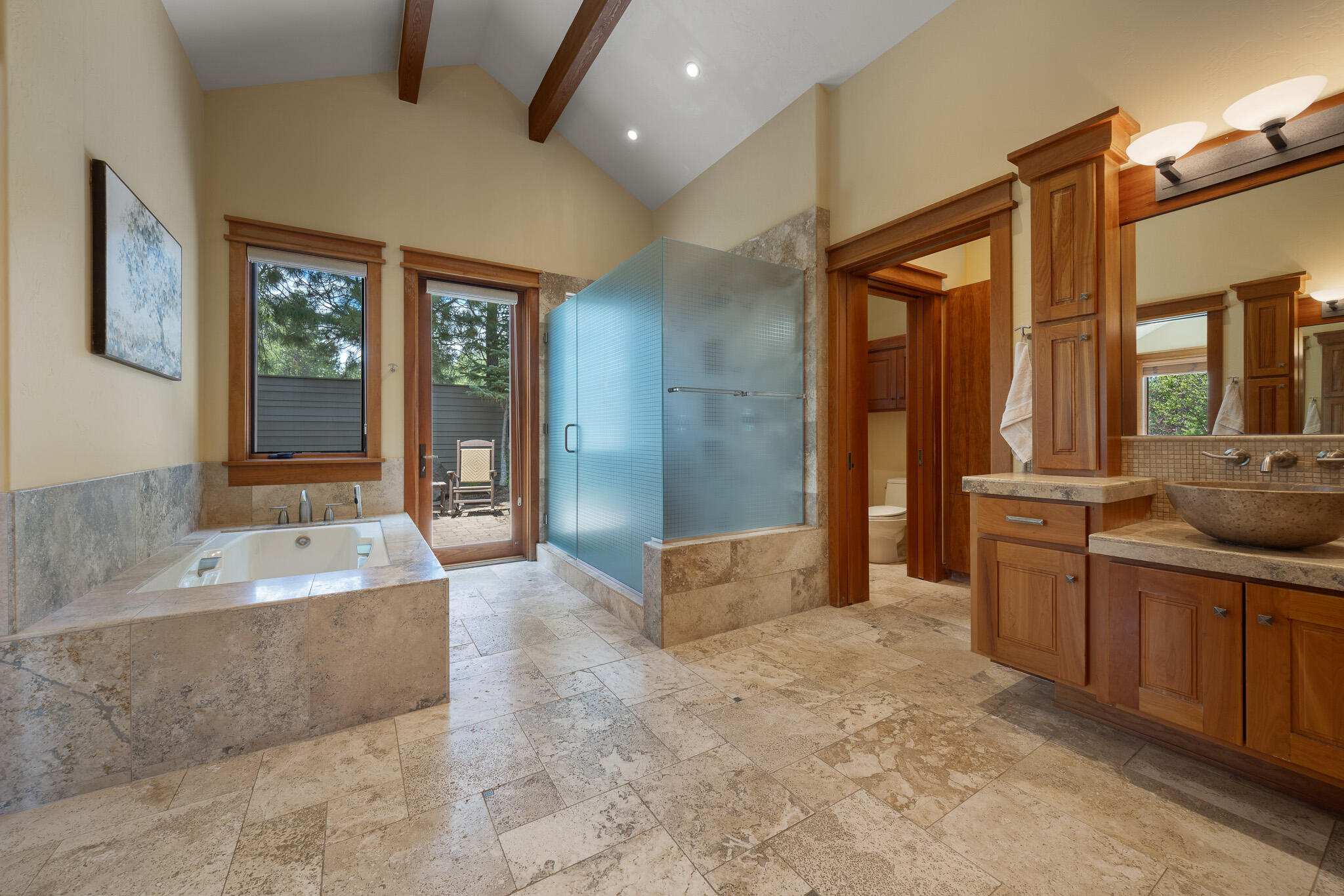 18883 Sutherland Court Bend, OR 97702 - Photo 25 of 70 Your personal spa retreat?soaking tub, dual shower, and private garden patio for moments of pure relaxation.