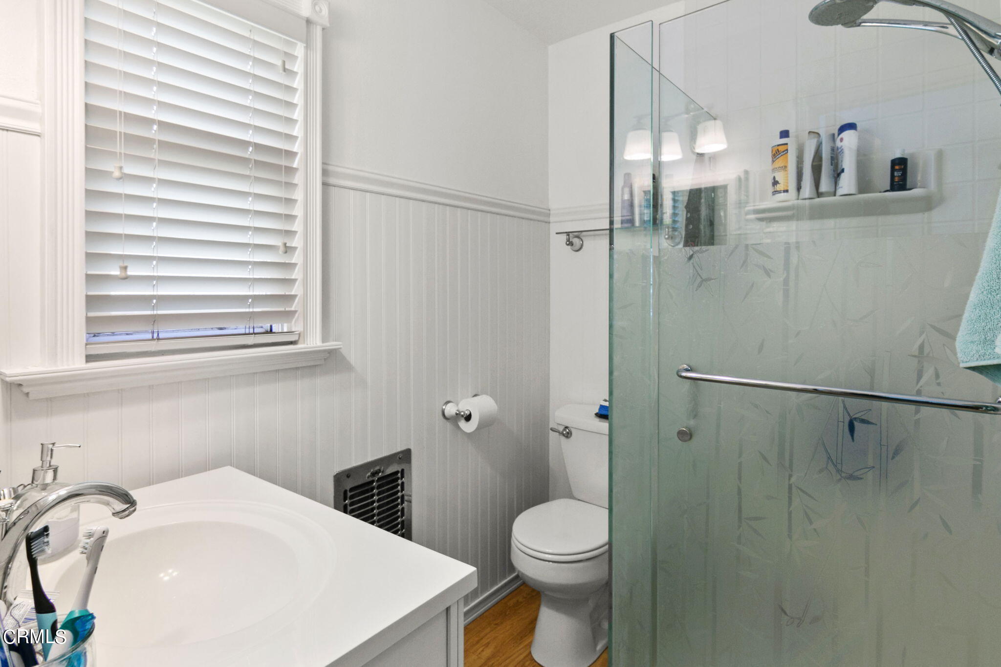 524 Nectarine Street Oxnard, CA 93033 - Photo 18 of 28 a bathroom with a sink a toilet and shower