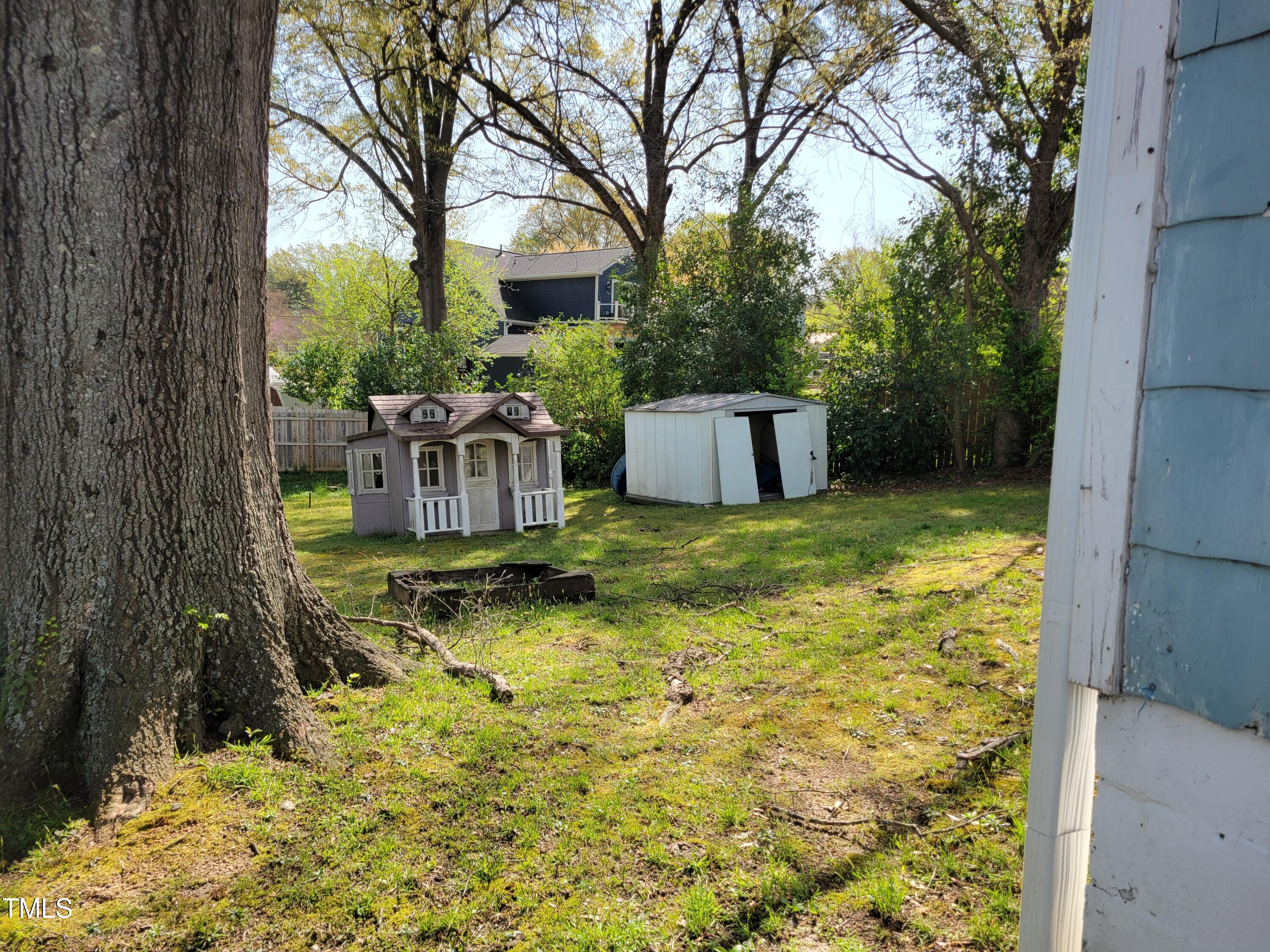 109 Plainview Avenue Raleigh, NC 27604 - Photo 3 of 4 a view of a house with backyard and sitting area