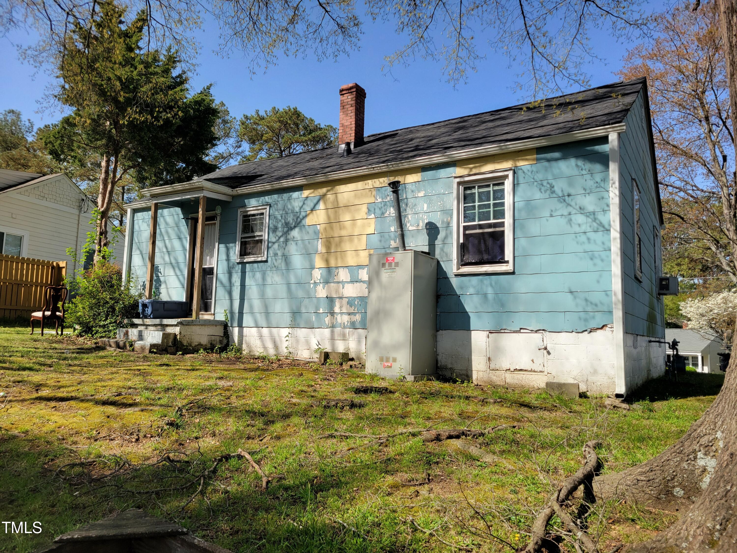 109 Plainview Avenue Raleigh, NC 27604 - Photo 4 of 4 a view of a house with backyard and sitting area