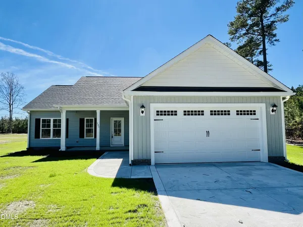 a view of a house with yard
