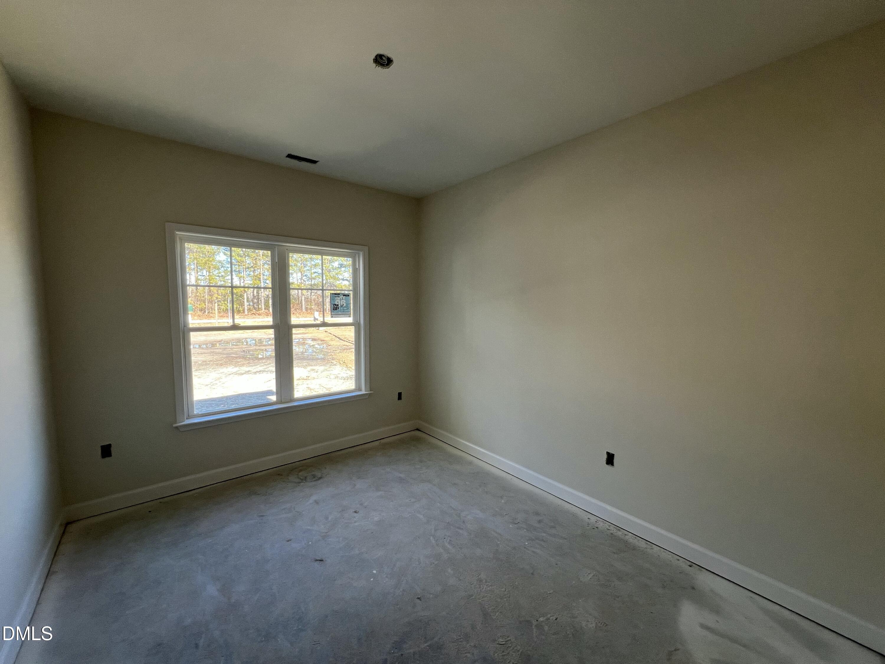 731 Polly Watson Road Fremont, NC 27830 - Photo 12 of 20 an empty room with a window