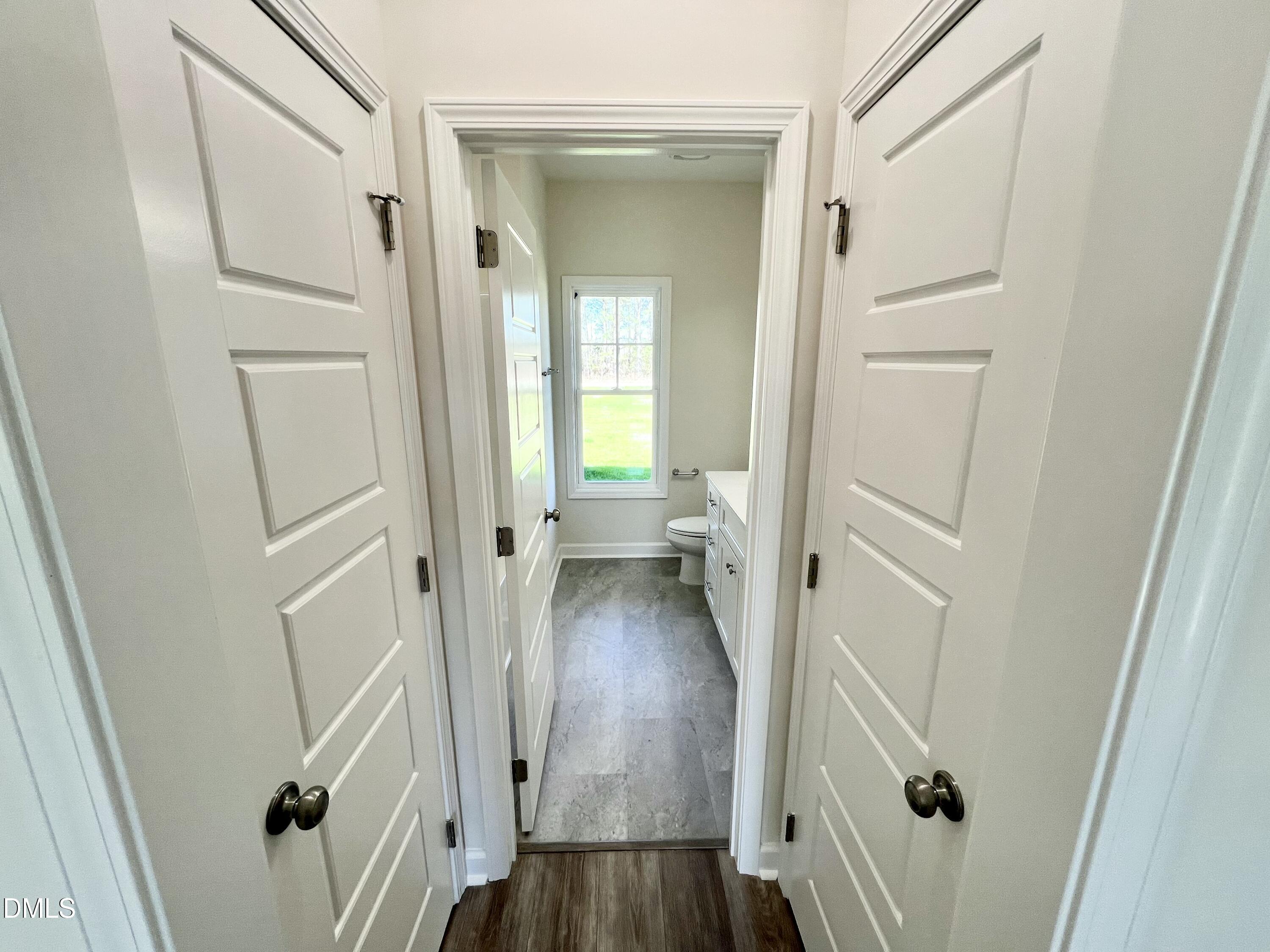 731 Polly Watson Road Fremont, NC 27830 - Photo 15 of 21 a view of a hallway with wooden floor and closet