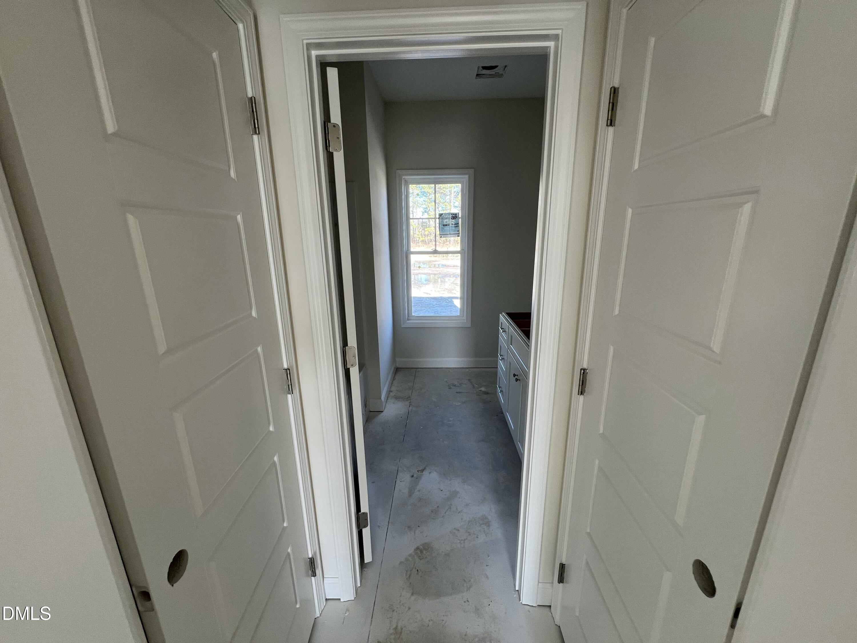 731 Polly Watson Road Fremont, NC 27830 - Photo 16 of 20 a view of a bathroom from a corridor