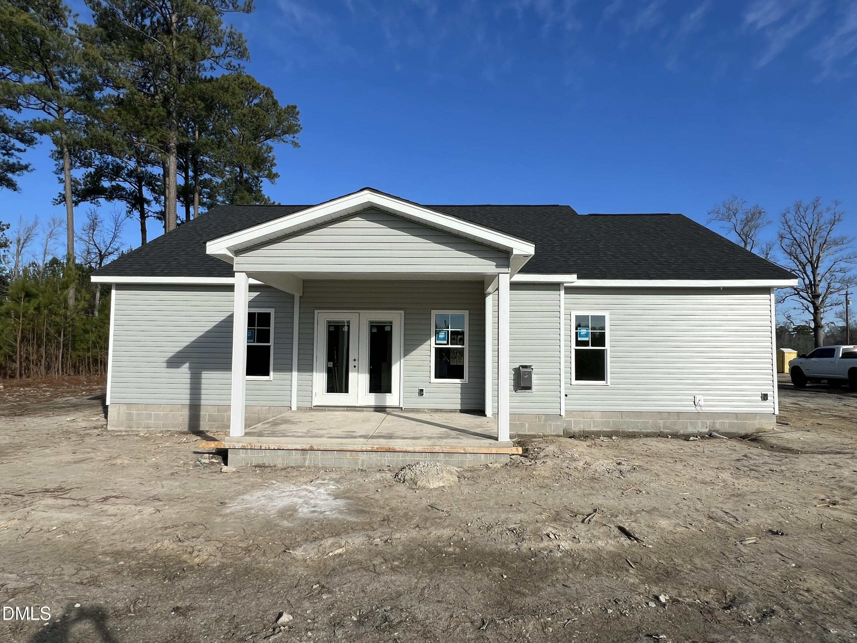 731 Polly Watson Road Fremont, NC 27830 - Photo 19 of 20 a front view of a house with garden