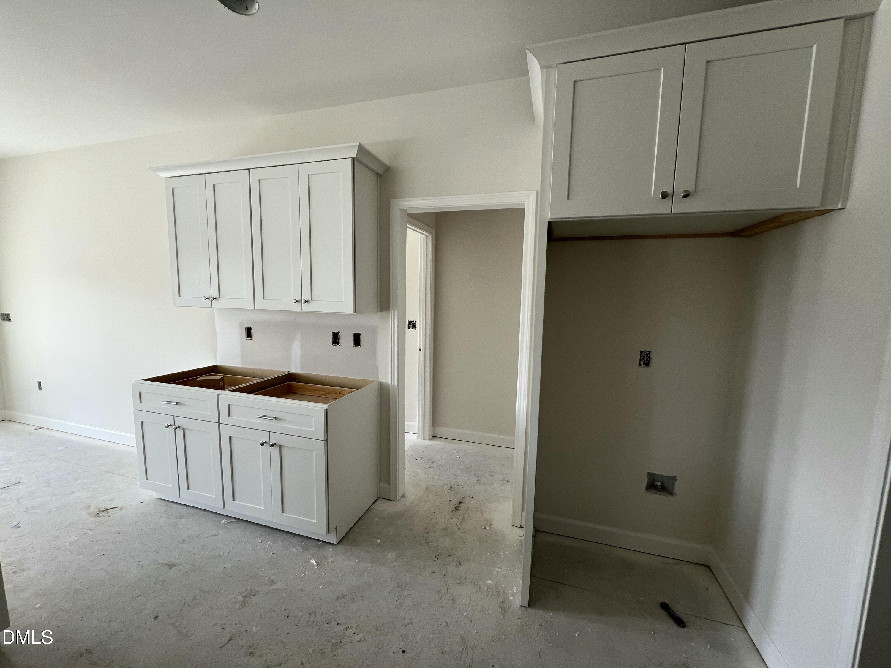 731 Polly Watson Road Fremont, NC 27830 - Photo 8 of 20 a view of a kitchen with white cabinets