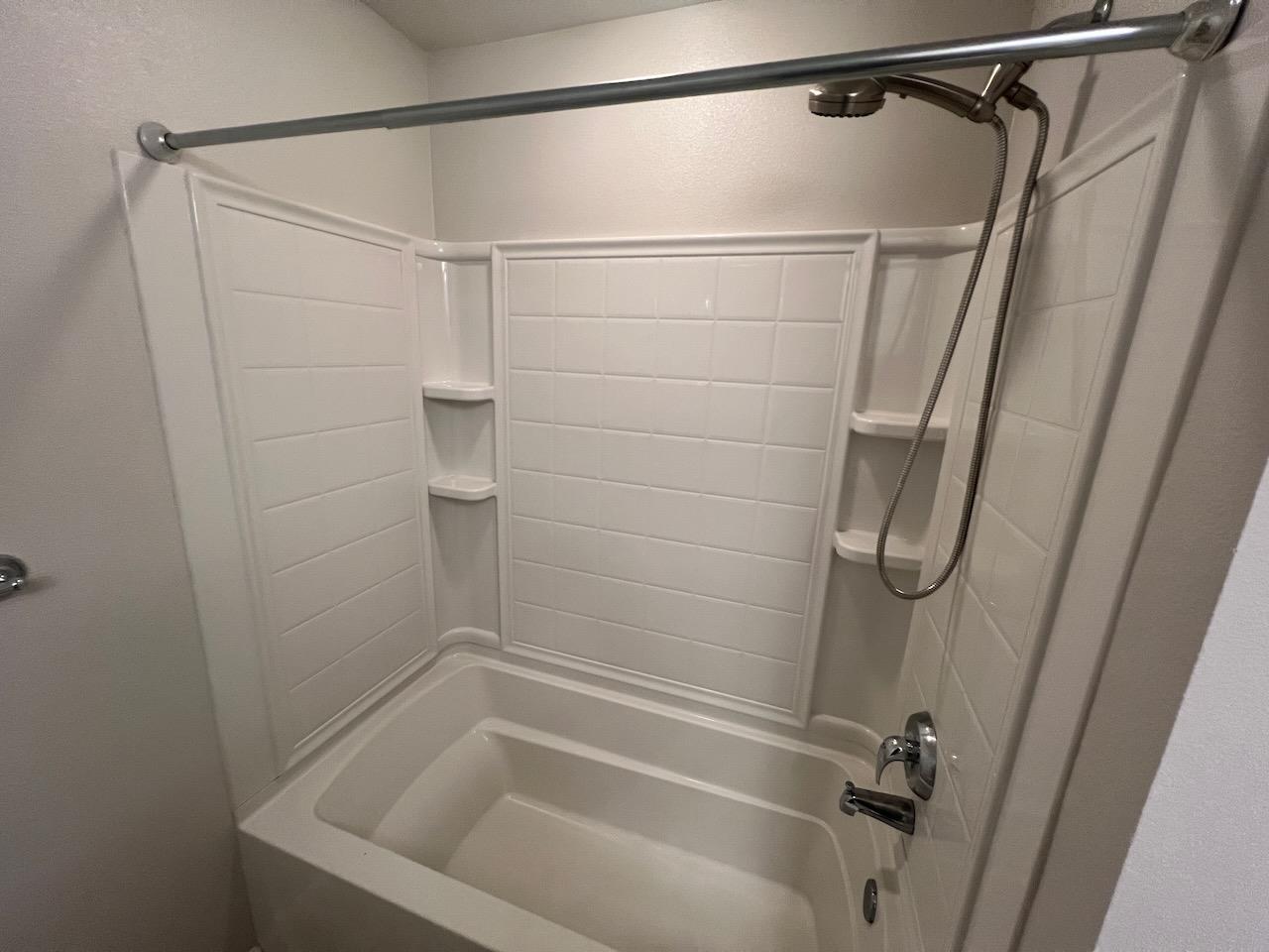 800 North 8th Street, Unit 120 San Jose, CA 95112 - Photo 17 of 21 a bathroom with a shower and a bath tub