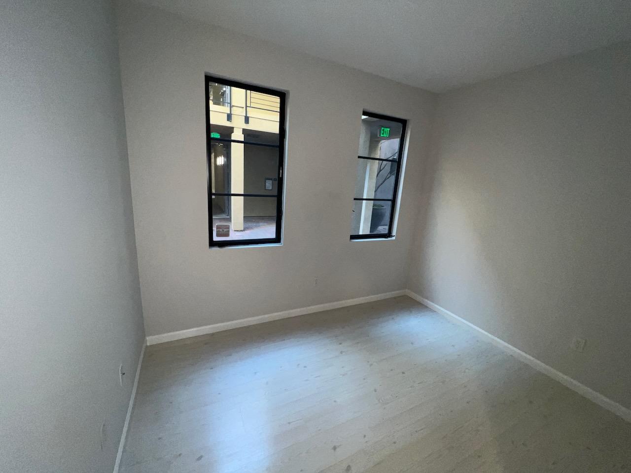 800 North 8th Street, Unit 120 San Jose, CA 95112 - Photo 18 of 21 an empty room with windows and closet