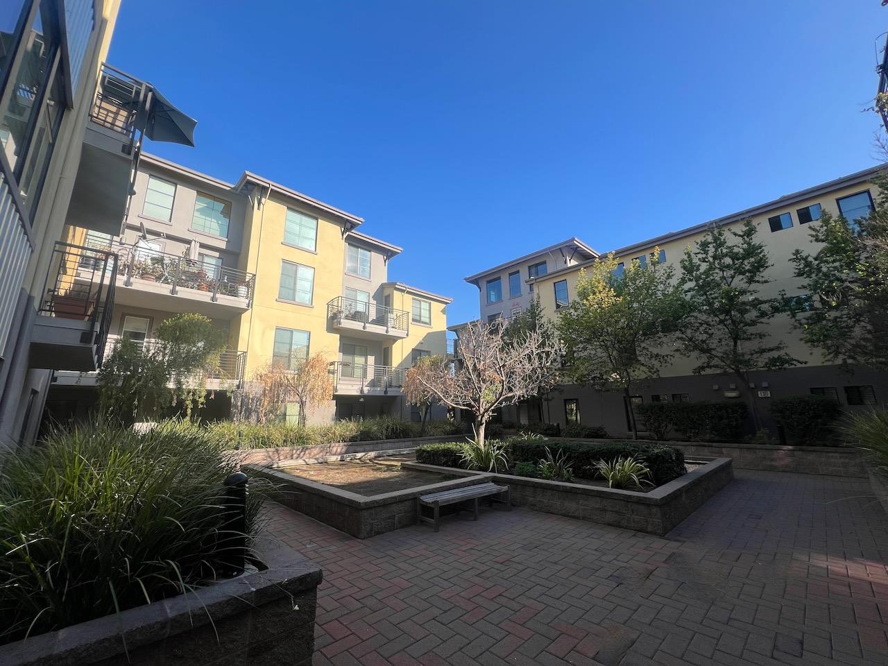 800 North 8th Street, Unit 120 San Jose, CA 95112 - Photo 2 of 21 a view of outdoor space with swimming pool and outdoor seating