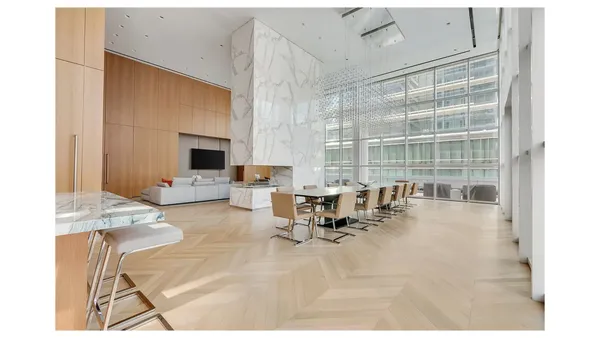 a view of a living room with furniture