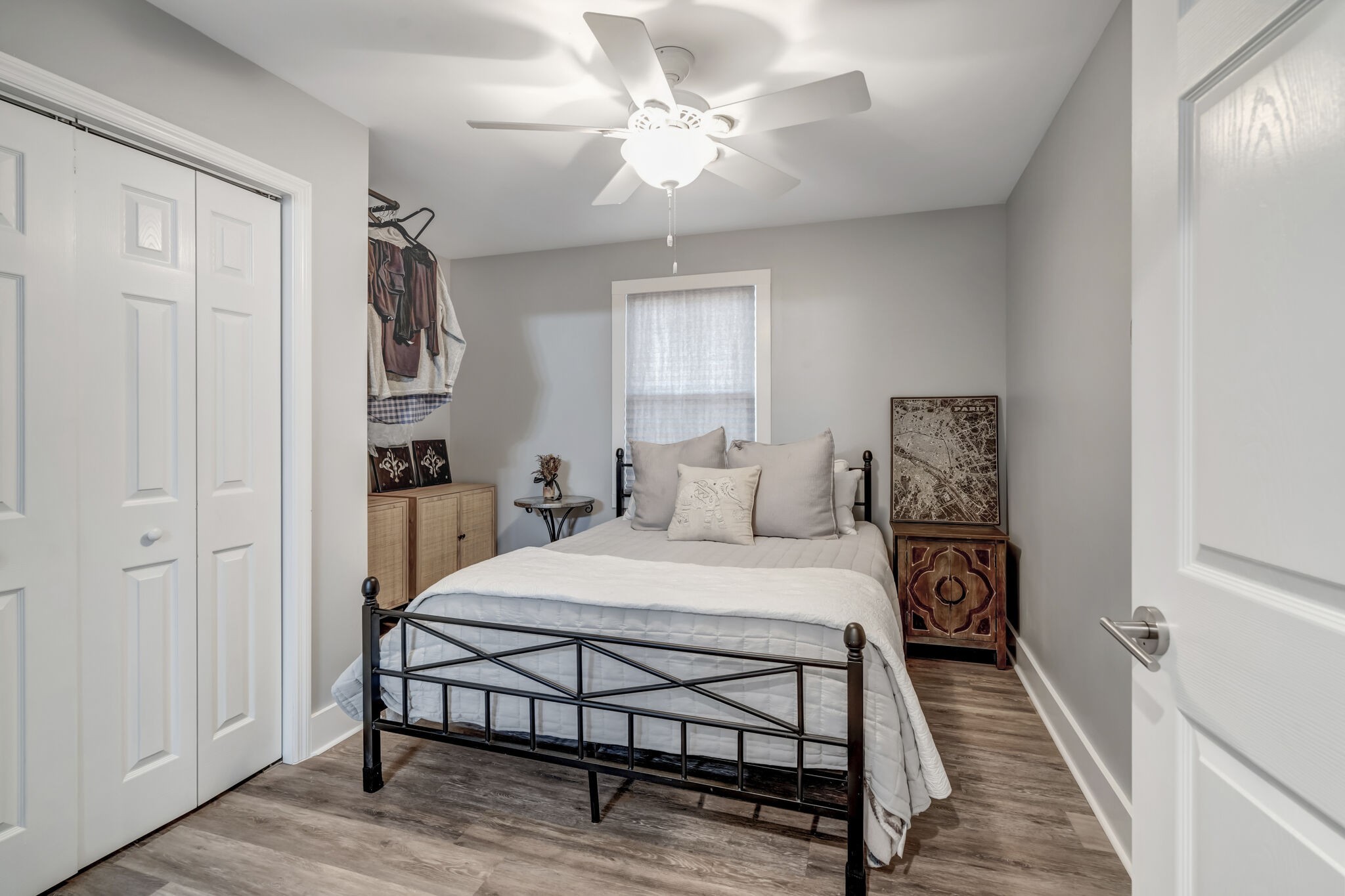 114 River Road Hendersonville, TN 37075 - Photo 10 of 34 a bedroom with a bed and a chandelier