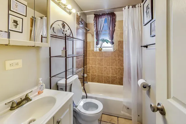 a kitchen with stainless steel appliances granite countertop a sink dishwasher stove and cabinets
