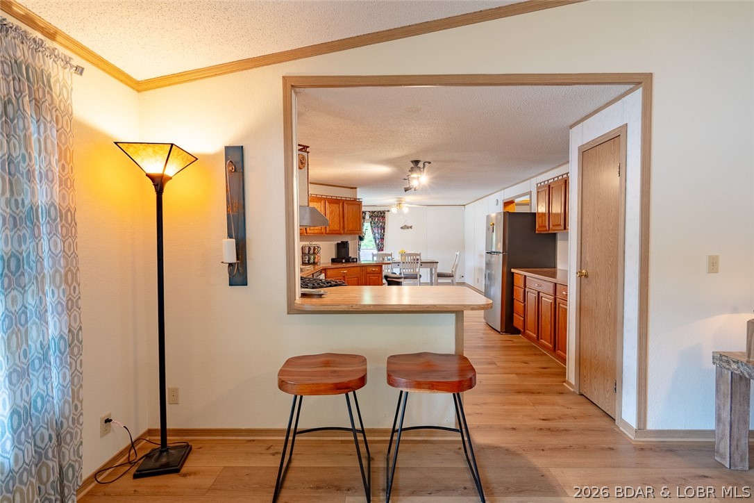 3135 Lick Creek Road Edwards, MO 65326 - Photo 7 of 94 open to the kitchen and dining area