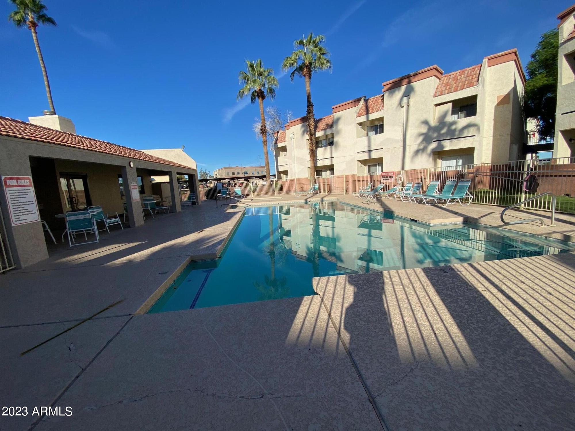 12123 West Bell Road, Unit 227 Surprise, AZ 85378 - Photo 51 of 52 CLIFFS POOL SPA AREA (2)