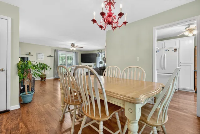 a view of an entryway with wooden floor and a window
