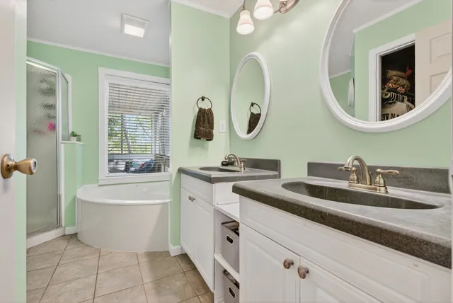 a bedroom with a bed and a desk