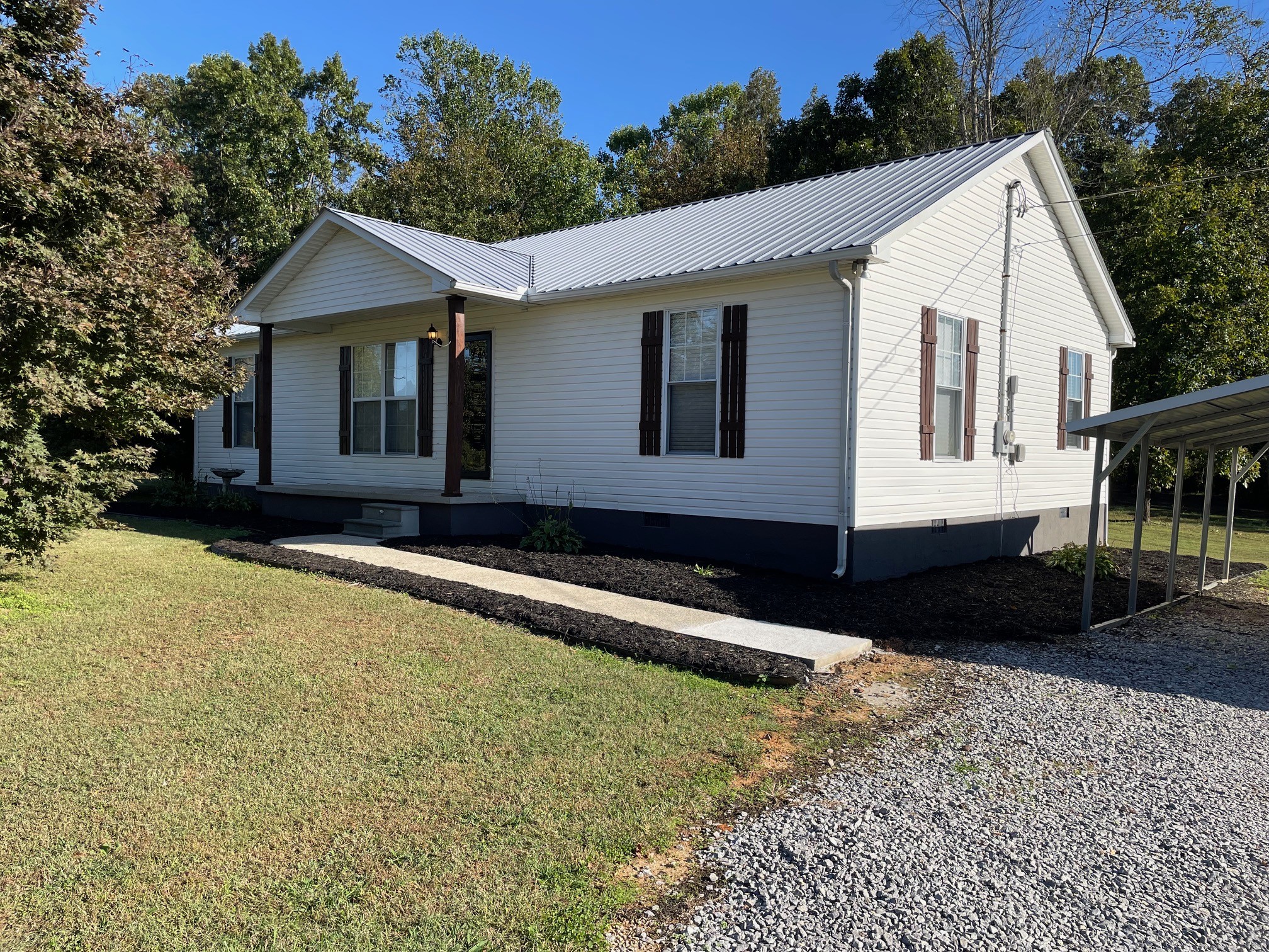295 Brown Road Morrison, TN 37357 - Photo 2 of 29 a front view of a house with a yard