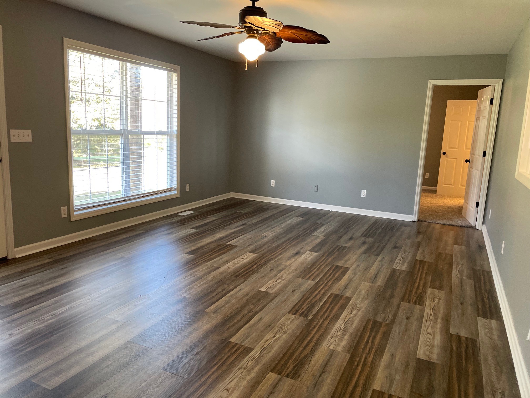 295 Brown Road Morrison, TN 37357 - Photo 12 of 29 wooden floor in an empty room with a window