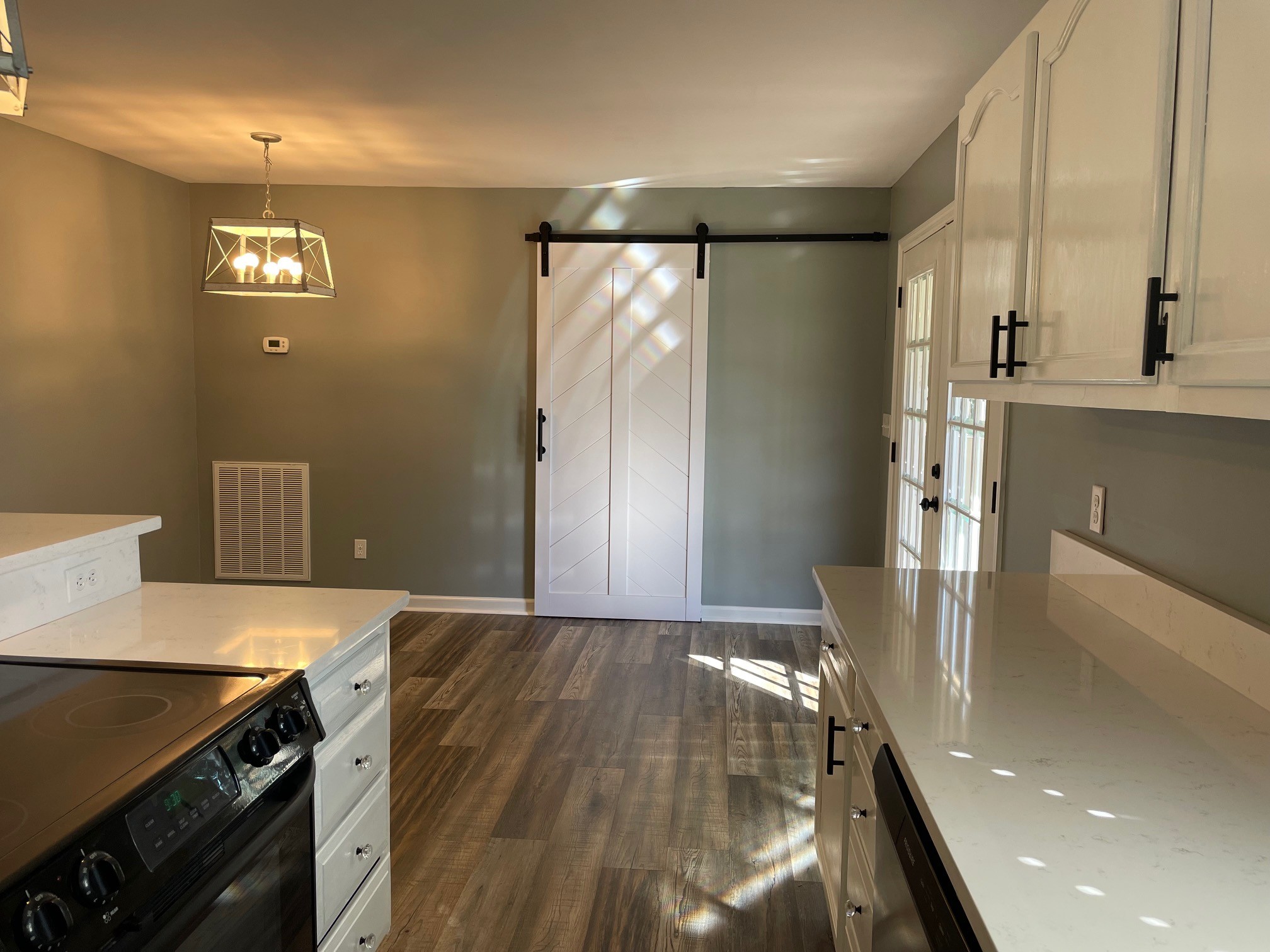 295 Brown Road Morrison, TN 37357 - Photo 22 of 29 a kitchen with granite countertop a refrigerator and a stove
