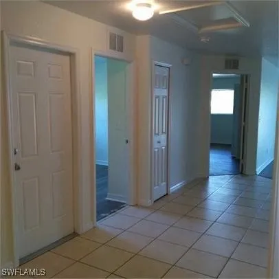 a kitchen with stainless steel appliances a sink and a refrigerator