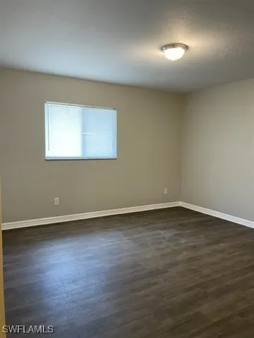 a bathroom with a toilet a sink and bathtub
