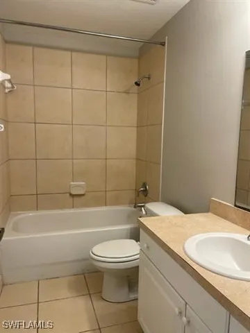 a view of a livingroom with an empty space and a window