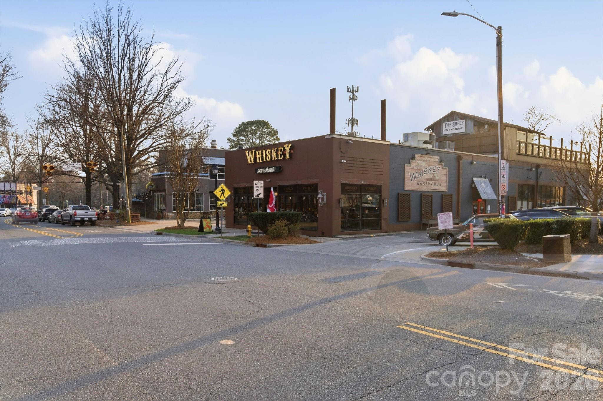 2116 McClintock Road, Unit 123 Charlotte, NC 28205 - Photo 20 of 28 a view of a street with cars