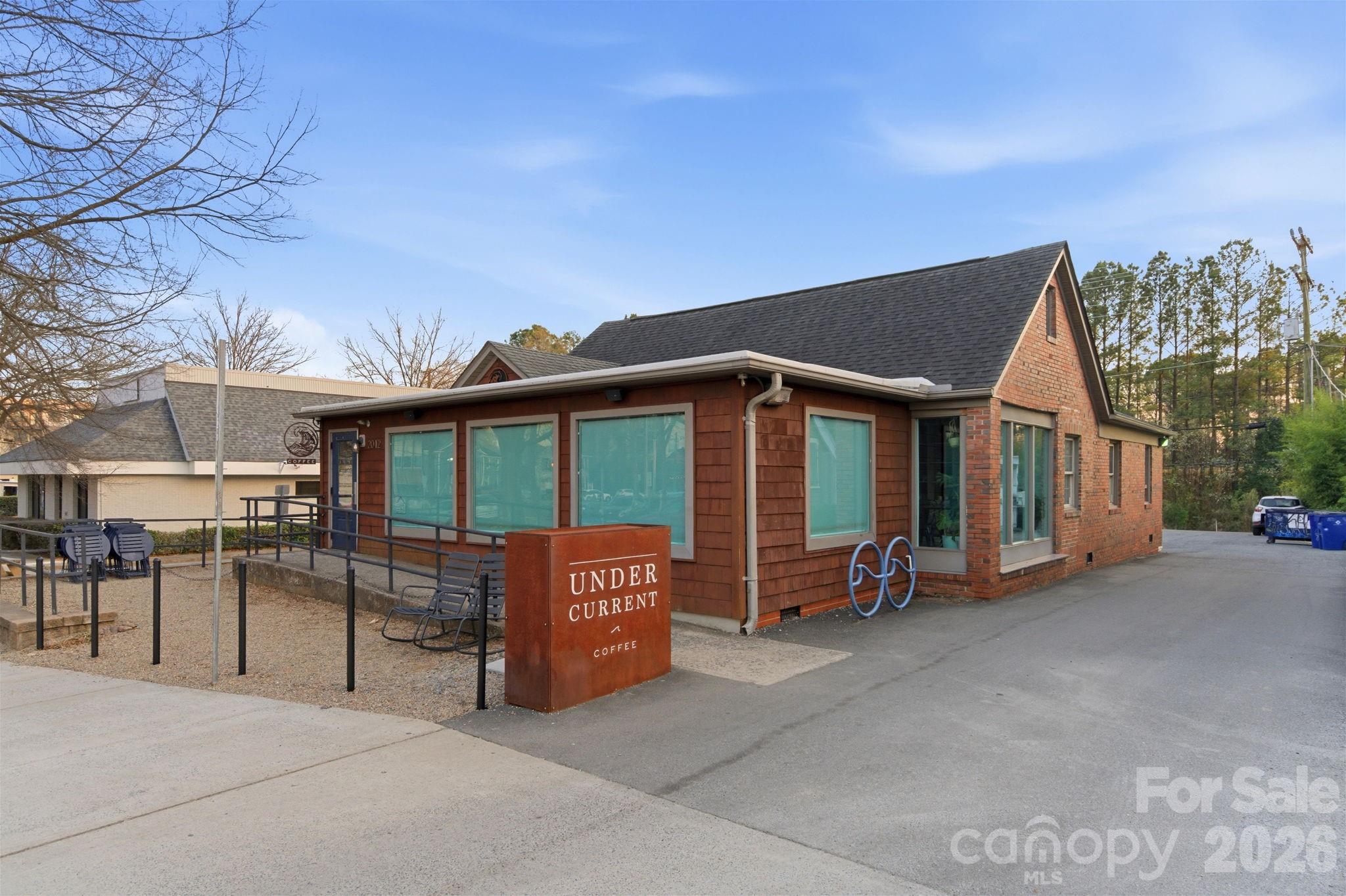 2116 McClintock Road, Unit 123 Charlotte, NC 28205 - Photo 21 of 28 a view of a house with a outdoor space