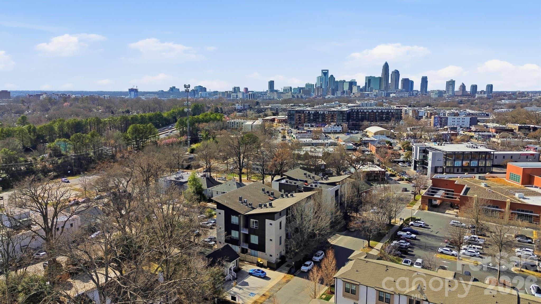 2116 McClintock Road, Unit 123 Charlotte, NC 28205 - Photo 27 of 28 an aerial view of a city with lots of residential buildings