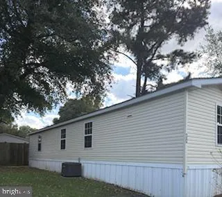 a view of a back yard of the house